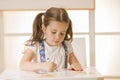 Little child writing letter A