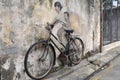 Little Children on a Bicycle street art mural by Lithuanian artist Ernest Zacharevic in Georgetown, Penang, Malaysia.