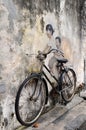 Little Children on a Bicycle street art mural by Lithuanian artist Ernest Zacharevic in Georgetown, Penang, Malaysia.