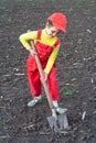 Little children with big shovel Royalty Free Stock Photo