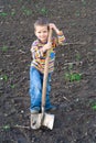 Little children with big shovel Royalty Free Stock Photo