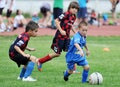 Little children boys play football or soccer