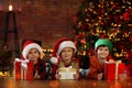 Children with Christmas gifts at home. Presents from Santa Claus Royalty Free Stock Photo