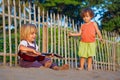 Little children have fun on sunset tropical beach Royalty Free Stock Photo