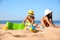 Little children playing at beach, focus on plastic toys Royalty Free Stock Photo