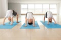 Little children practicing yoga indoors