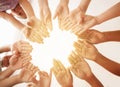 Little children putting their hands together in sunlit room Royalty Free Stock Photo