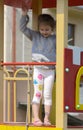 Little children run around and play in the playground. Game cent