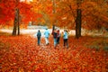 Running athletes in the park on a run in the early morning. Several children are running in the woods doing sports Royalty Free Stock Photo