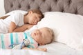 Little children sleeping in bed