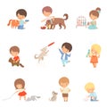 Little Children Taking Care of Domestic Animals and Playing with Them Vector Set