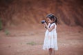 Little Children Taking Photo by mirrorless camera