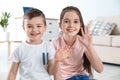 Little children using video chat at home