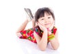 Little girl laying on floor and smile Royalty Free Stock Photo