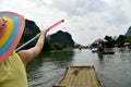 a little chinese girl on yulong river, yangsuo county ,chiina