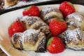 Little chocolat croissants with strawberries