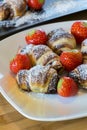 Little chocolat croissants with strawberries