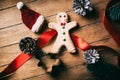 Little Christmas gingerbread man cookie with Santa Claus hat Royalty Free Stock Photo