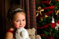 Little Christmas Princess, girl hugging plush bear