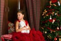 Little Christmas Princess, girl looks out window