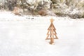 Little Christmas tree in fresh snowfall