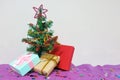 Little Christmas tree and gift boxes