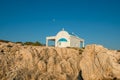 Little church by the rocky sea shore Royalty Free Stock Photo