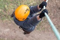 Little climber hanging on a rope Royalty Free Stock Photo