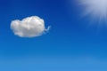 Little cloud and sun against blue sky Royalty Free Stock Photo