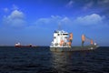 Container ship anchored close to the city of Alicante. Royalty Free Stock Photo