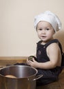 Little cook with eggplant and casserole