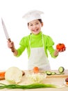 Little cook with knife and tomatoes Royalty Free Stock Photo