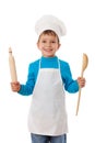 Little cook with ladle and rolling pin Royalty Free Stock Photo