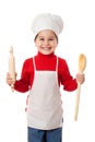 Little cook with ladle and rolling pin Royalty Free Stock Photo