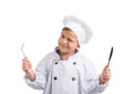 Little cook with fork and knife in hands on a white isolated background Royalty Free Stock Photo