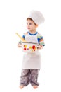 Little cook standing with ladle and pan Royalty Free Stock Photo