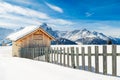 Little cottage covered with snow in the high Dolomites mountains Royalty Free Stock Photo