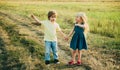 Little couple in love on countryside. Smiling friends laughing. Human emotions and lifestyle concept. Happy kid on Royalty Free Stock Photo