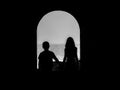 Little couple silhouette in the tunnel Royalty Free Stock Photo