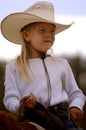 Little Cowgirl on Horseback #1 Royalty Free Stock Photo