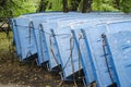 Little craft boats old row tidy. Row boats parked arranged in marina charmouth dorset summer day holiday Royalty Free Stock Photo