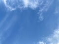 the little crescent moon on the upper right corner of the bright blue sky Royalty Free Stock Photo