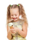 Little curly girl eating ice cream in studio