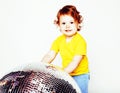 Little cute adorable baby girl holding disco ball isolated on white close up, sweet real toddler, lifestyle people Royalty Free Stock Photo