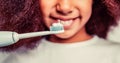 Little cute african american girl brushing her teeth. Healthy teeth. Small afro girl, toothbrush. Multiracial girl Royalty Free Stock Photo