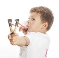 Little cute angry boy with slingshot isolated