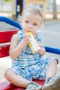 Little cute baby drinking juice from straw Royalty Free Stock Photo