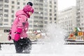 Little cute baby girl having fun on playground at winter. Children winter sport and leisure outdoor activities Royalty Free Stock Photo