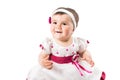 Little cute baby-girl in pink dress isolated on white background Royalty Free Stock Photo