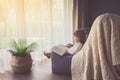 Little cute baby girl reading a book Royalty Free Stock Photo